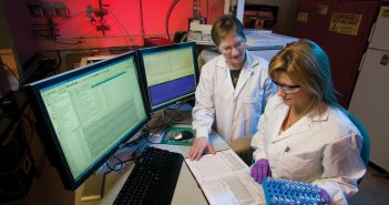 New liquid chromatography system and chromatography data system software launched by Thermo Fisher scientists-in-lab-at-computer